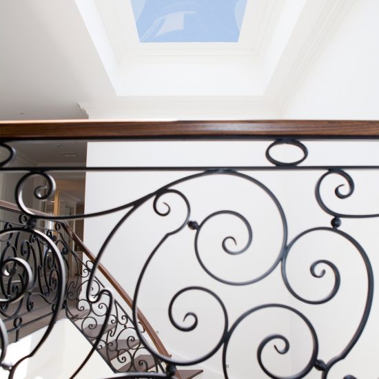 wrought iron staircase, wrought iron balustrade, iron and timber balustrade, skylight, skylight over stairwell